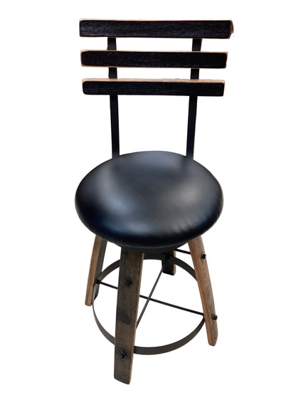 Whiskey barrel table with 2 barstools.